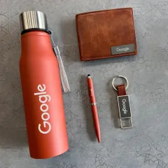 Here’s a branded merchandise set I put together for Google. It includes a temperature bottle, a faux-leather wallet, a pen, and a keychain, all customized with the Google logo for a cohesive and memorable employee gift.