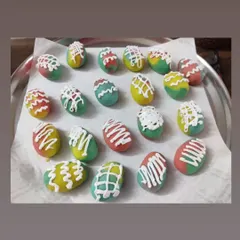 My handmade marzipan Easter eggs, decorated with a delicate white chocolate drizzle. The multi-colored eggs look festive and taste delicious.