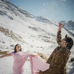 Capturing the pure, unscripted joy of a playful moment in the snow. This is for couples who want their pre-wedding shoot in Manali to be full of laughter and spontaneous fun.