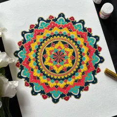 The beauty of ornate mandalas lies in their rich colors and bold patterns. This piece, painted with acrylics, shows how we can combine traditional motifs with a vibrant palette to create something truly stunning.