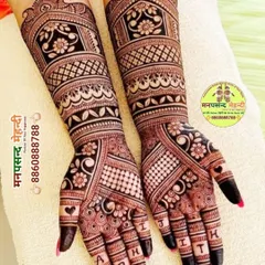 A beautiful design featuring the initials 'ABHI' and 'JITH' on the fingers. This is a subtle and stylish way to personalize your mehndi.