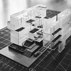 An intricate acrylic architectural model for a residential project. We build detailed physical models like this to understand and test the complex interplay of spaces, levels, and light, ensuring the final design feels right before the first brick is laid.