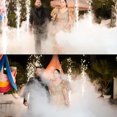 A dramatic entrance for the couple at their outdoor Sangeet, walking through a cloud of smoke and surrounded by cold pyro fireworks.