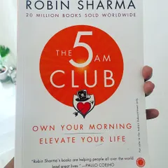 I'm not usually one for self-help books, but "The 5 AM Club" by Robin Sharma is different. It's a treasure trove of information on time management, consistency, and finding balance, which are all keystones of my coaching philosophy.