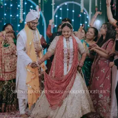Seven pheras, one promise: forever together. This powerful shot captures the couple taking their sacred vows, surrounded by the joy and energy of their loved ones.
