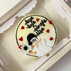 Celebrate the end of single life with this beautiful cake for a bride-to-be. It features an illustration of a bride in her veil with the message "bye bye single life."