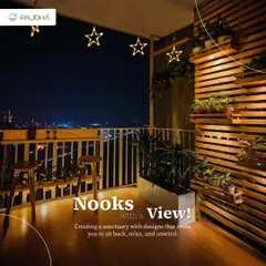 Nooks with a view. This cozy balcony at night, overlooking the city, is a perfect sanctuary. I used wooden slat walls for vertical planting, a custom bar table, and star-shaped lights to create a magical, relaxing vibe.