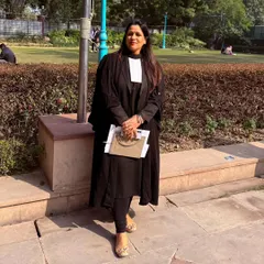 Dressed in my advocate's robes, ready for a day in court. This attire is a symbol of my responsibility to uphold the law and fight for justice on your behalf.