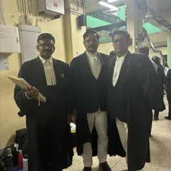 With the Deputy Solicitor General of India at the Calcutta High Court. Interacting with senior government counsel is an essential part of my practice in constitutional and administrative law.