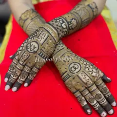 This engagement design features the couple's initials "YK" and interlocking rings, surrounded by beautiful traditional patterns.