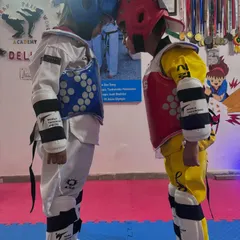 The moment before the match. This is where focus and discipline take over. I prepare my students not just to fight, but to face their challenges with courage, head-on.