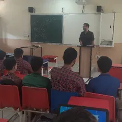 A trainer delivers a presentation on digital security. We cover essential topics to help students understand the importance of protecting their personal information online.