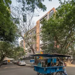 This street-level view of ARCUS shows how the building interacts with the daily life of the T Nagar neighborhood. We designed the structure to integrate into the bustling urban environment while providing a private sanctuary for residents.