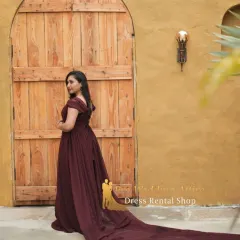 My maroon chiffon trail gown is perfect for an earthy, rustic aesthetic. The deep, rich color and soft, flowing fabric create a romantic and elegant look.