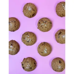 Our clean cookie is made with almonds, tahini, chocolate, a flax egg, jaggery powder, and sea salt. I dare you to try it and not like it.