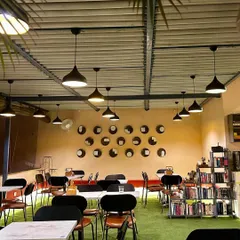 This installation at Café Quaint reflects our vision of upcycling. We repurposed old dinner plates to create a wall pattern inspired by JKK's architecture, a DIY project that brings sustainability to the forefront.