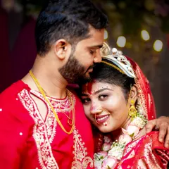 The quiet moments are just as important as the loud celebrations. Here, we captured a tender moment during a traditional Bengali wedding, highlighting the rich colors and deep emotions of the ceremony.