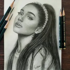 A realistic graphite portrait of Ariana Grande. I focused on capturing her distinct features and the soft texture of her hair, using professional Faber-Castell pencils for a smooth, lifelike finish.