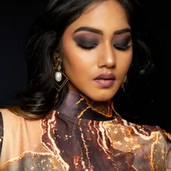 A portfolio shoot at our studio. This look features a dramatic, dark smokey eye, perfect for editorial or fashion work.