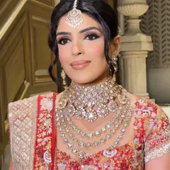 Another angle of this regal bridal look. The HD makeup provides a flawless finish that lasts through all the ceremonies, ensuring you look perfect from every angle.