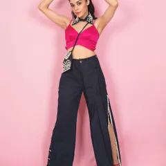 For this studio shoot with actress Eisha Singh, we used a vibrant pink background to make the colors of the outfit pop. This high-energy image is perfect for brands targeting a younger audience, showcasing a playful and trendy fashion style.