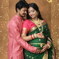 We celebrate love in all its forms, including beautiful traditional attire. This couple's portrait in a stunning green saree and kurta shows how we blend cultural elegance with intimate maternity photography for a truly personal session.
