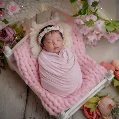 A princess in her floral bed. I use miniature props like this tiny bed and surround it with flowers to create a magical, fairytale scene.