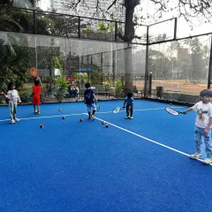 Learning tennis starts with the basics in a group setting. Here, our youngest players, some just starting out, get comfortable holding a racket and moving on the court, making friends while they learn.