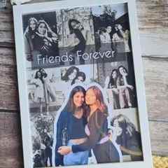 A closer look at our 'Friends Forever' mosaic photo frame. The contrast between the color pop and the monochrome background makes it a very artistic and eye-catching piece for any wall.