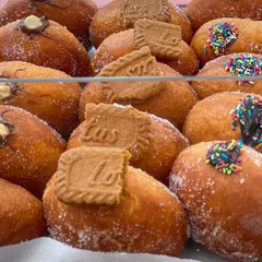 A close-up of my assorted stuffed donuts, featuring Biscoff, Nutella, and classic sprinkle toppings. They are always a hit at my pop-up stalls.