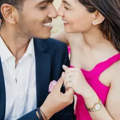 A close-up, intimate moment. The makeup is soft and natural, designed to look perfect in romantic, close-up photos.