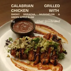 Another dish from our kitchen playground. Chef Shivanand's Calabrian Grilled Chicken with a smoky sriracha, muskmelon, and green apple slaw. A plate full of invention.