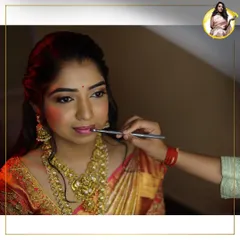 A behind-the-scenes shot of me applying the final touches to a bridal look. My classes give you hands-on experience to build the confidence and precision needed for professional bridal makeup artistry.
