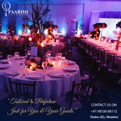 Our service is tailored to perfection, just for you and your guests. This image of a grand, beautifully lit wedding reception hall demonstrates the scale and elegance we bring to large-scale celebrations.