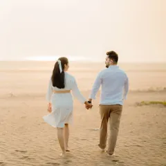 Walking towards the sunset on the beach, this shot of Milan and Pranali symbolizes their journey ahead. The soft, hazy light creates a dreamy and peaceful mood.