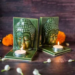 This handcrafted ceramic Buddha tealight holder brings a sense of peace to any space. It is designed to be versatile: use it as a bookend, style it on a tabletop, or use the hole in the back to hang it on a wall for a beautiful candle-lit effect.