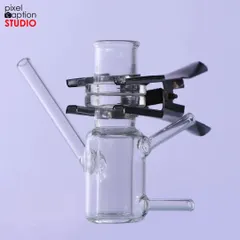 A glass instrument with a metal clip, showing how we can clearly photograph products made of multiple materials.