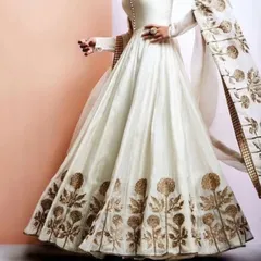 An inspiration photo for a beautiful white and gold Anarkali gown. I love working with clients to bring elegant designs like this to life with custom embroidery and tailoring.