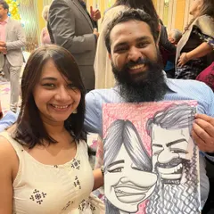This couple's caricature captures their fun-loving spirit. It was a pleasure drawing them at the Sheraton.