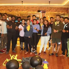 Our crew after a tough workout. We believe that together, everyone achieves more. This is our fitness family, a mix of men and women who support each other every step of the way.