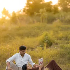 A quiet moment for an expecting couple during a golden hour outdoor session. I focus on capturing these natural, unposed interactions that you will cherish forever.