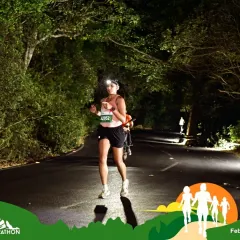 Navigating a dark, tree-lined path with a headlamp during an ultra. This is where mental toughness and race strategy become just as important as physical fitness.