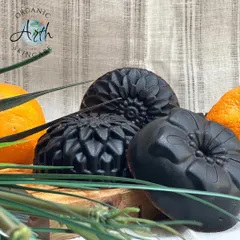 My 'Wake Me Up' soap, made with activated charcoal, ground coffee, and citrus. The intricate floral mold makes it a beautiful addition to your bathroom, and the ingredients help to detoxify and exfoliate your skin.