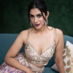 Our stunning model doing her magic with those beautiful eyes. For this ethnic wear shoot, I created a dramatic smokey eye and a bold lip to match the glamorous outfit.