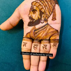 A portrait of Chhatrapati Shivaji Maharaj, a figure of great respect. I focus on capturing the powerful expression and details like the 'tripundra' on the forehead and the 'Maharaj' lettering on the fingers. This is a popular request for festivals and cultural events.