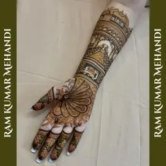 The full view of the peacock feather design, showing how the intricate patterns on the palm and fingers complement the central theme.