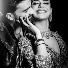 In the quiet moments, love speaks the loudest. This black and white candid shot of Karan and Pranavi captures the pure, unscripted joy and intimacy that we look for throughout the wedding day. It’s these real emotions that make a film truly personal.
