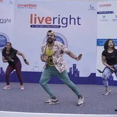 I lead sessions for large-scale corporate wellness events, like this one for Novo Nordisk's 'liveright' challenge. On stage, I guide employees of all fitness levels through an engaging and memorable workout.