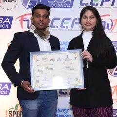 Here I am with my colleague Amrutha Vipin, receiving a membership certificate. We are committed to upholding the highest standards in the fitness education industry.