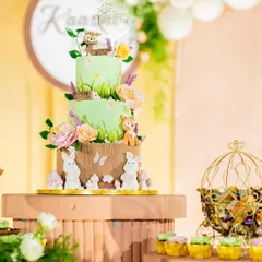 An identical shot of the charming woodland cake, providing a clear view of the intricate details and craftsmanship.